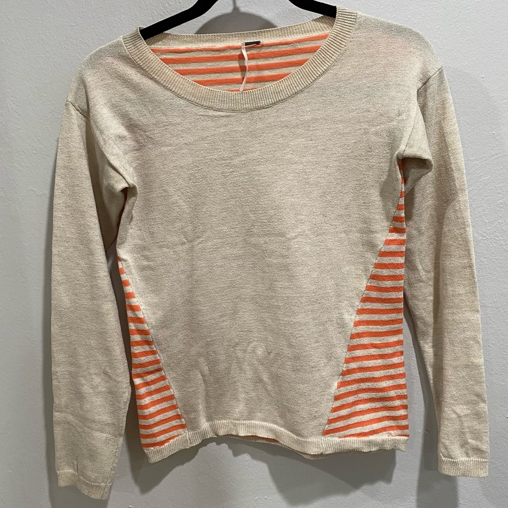 Women sweater in beige and orange stripes
